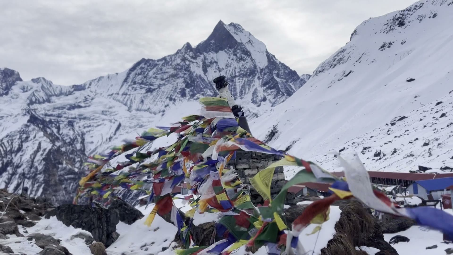 Machhapuchhre above Annapurna Base Camp, prayer flags in the wind